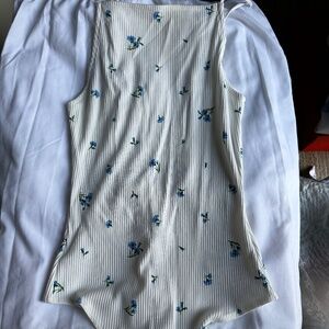 Ivory floral spaghetti strapped bodysuit